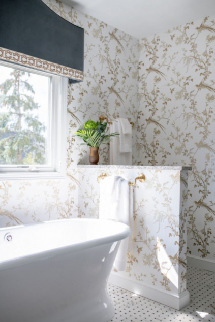 Bathroom with golden and white wallpaper Hudson Ohio interior design Lindsey Putzier 