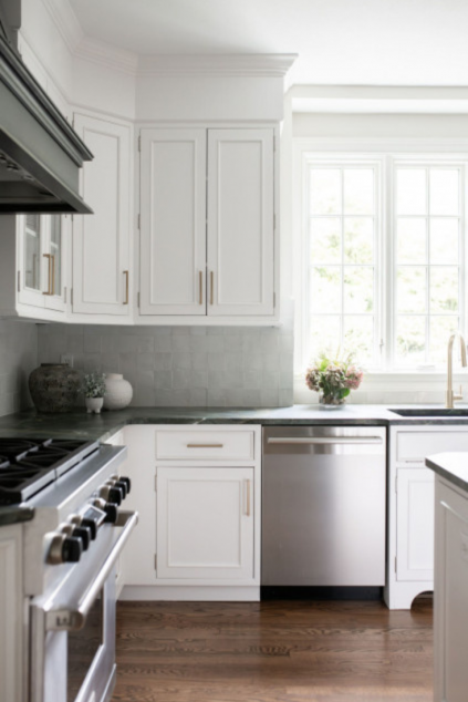 Kitchen with white cabinets and gold hardware. Hudson Ohio interior design Lindsey Putzier 