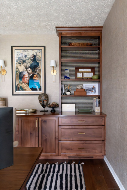 Home office with artwork and custom shelving. Hudson Ohio interior design Lindsey Putzier  