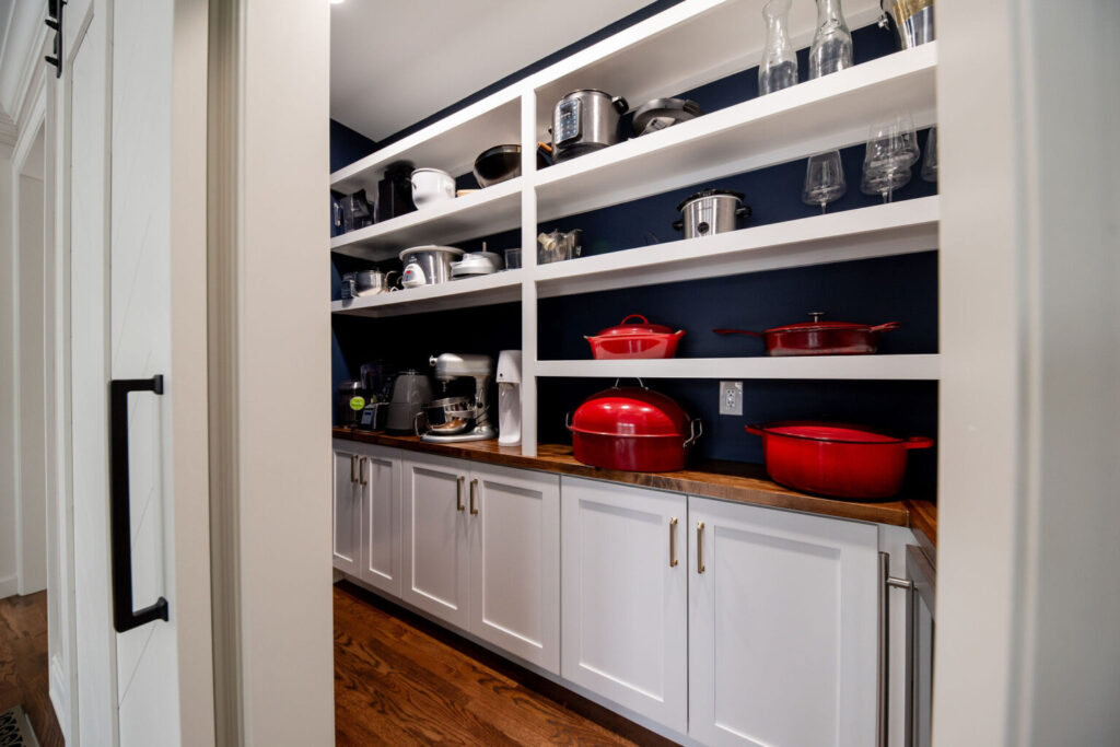 Pantry with open shelving for large countertop appliances. aging in place, Hudson Ohio Lindsey Putzier interior design