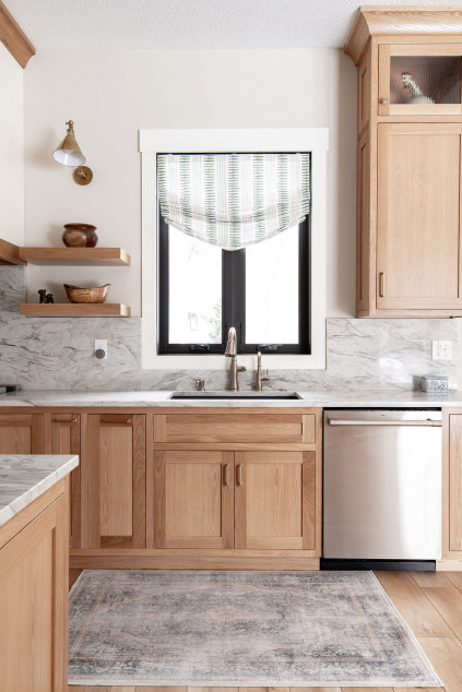 Kitchen with a neutral window treatment - roman shade. Hudson Ohio interior design Lindsey Putzier 
