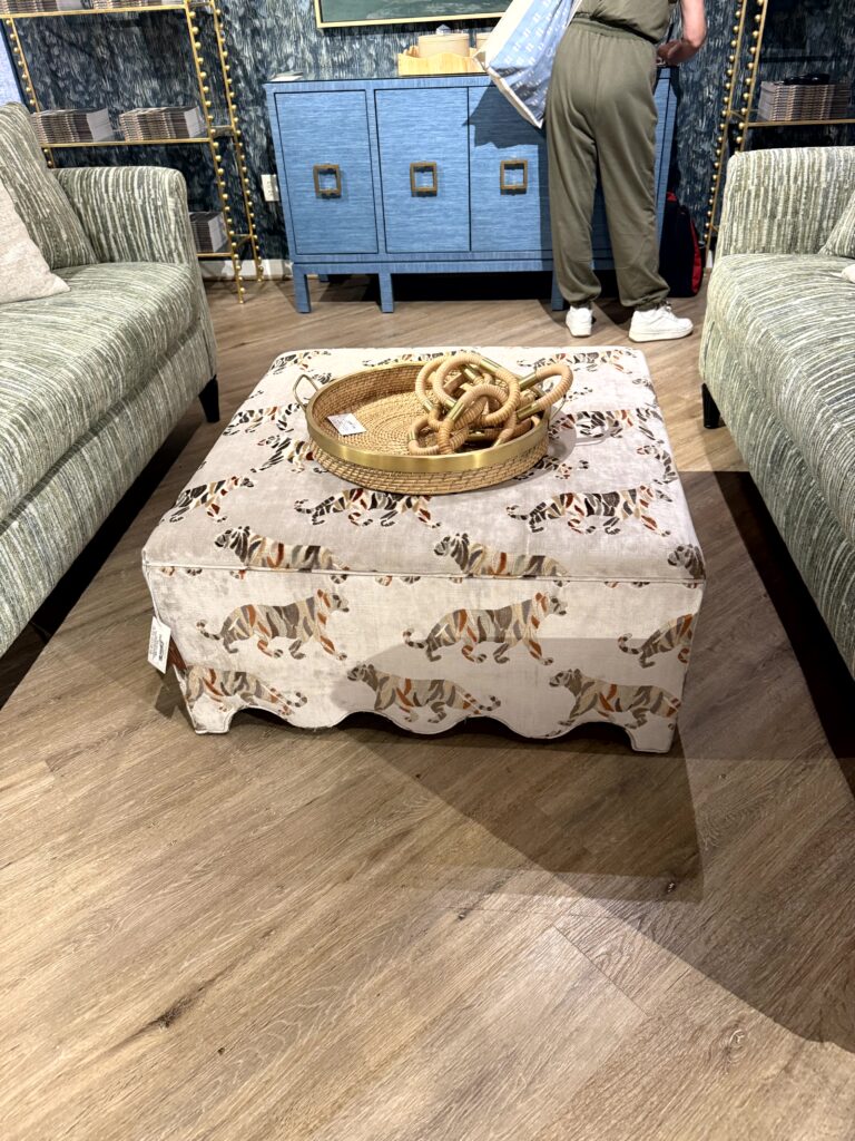 Patterned ottoman with scalloped bottom. High Point Market Lindsey Putzier interior design, Hudson Ohio 