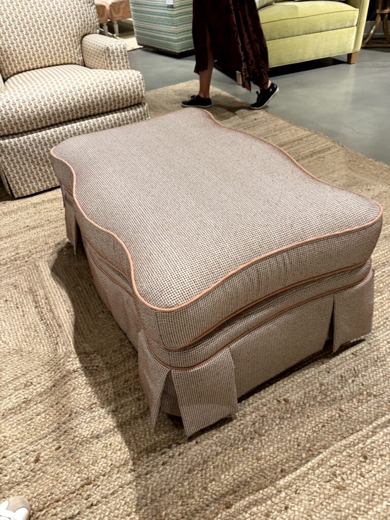 Ottoman with scalloped shape. High Point Market Lindsey Putzier interior design, Hudson Ohio 