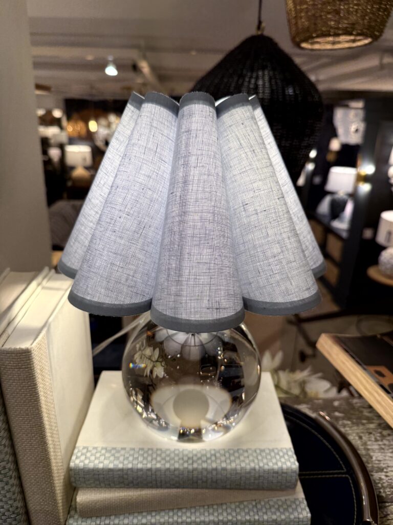 Small lamp with a scalloped shade. High Point Market Lindsey Putzier interior design, Hudson Ohio 