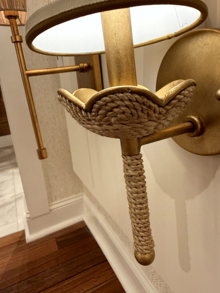 Wall sconce with scalloped edge detail. High Point Market Lindsey Putzier interior design, Hudson Ohio 