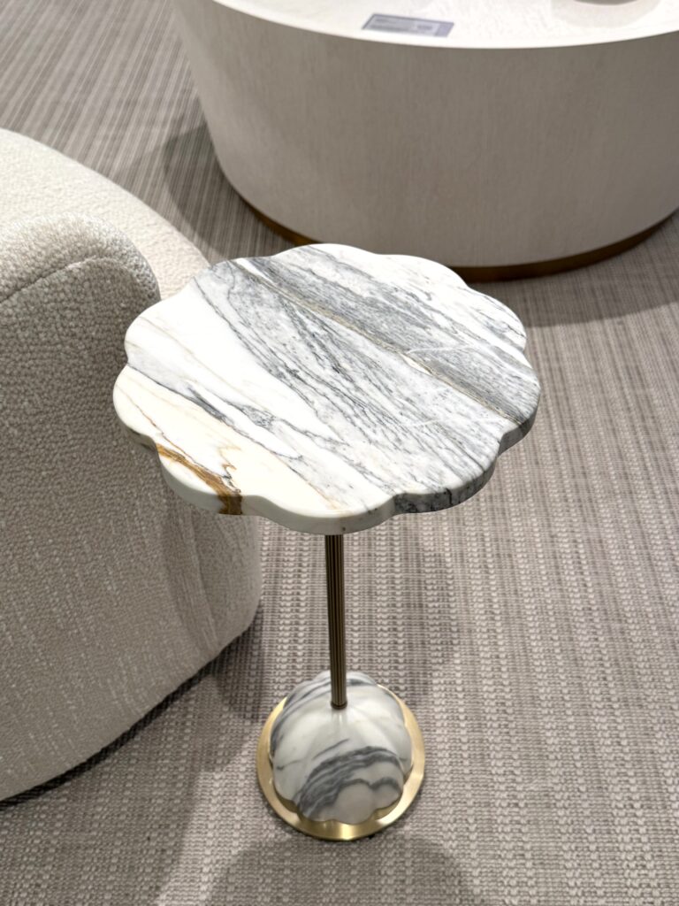 Drink table with scalloped edges. High Point Market Lindsey Putzier interior design, Hudson Ohio 
