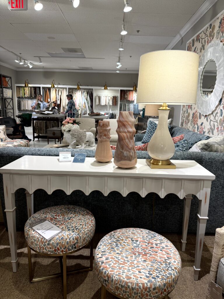 Sideboard with scalloped edges. High Point Market Lindsey Putzier interior design, Hudson Ohio 