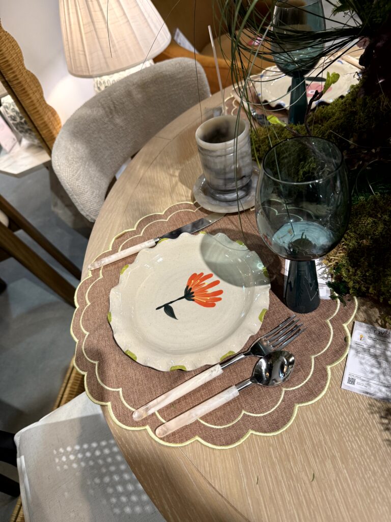 Plate and place setting with scalloped detail. High Point Market Lindsey Putzier interior design, Hudson Ohio 