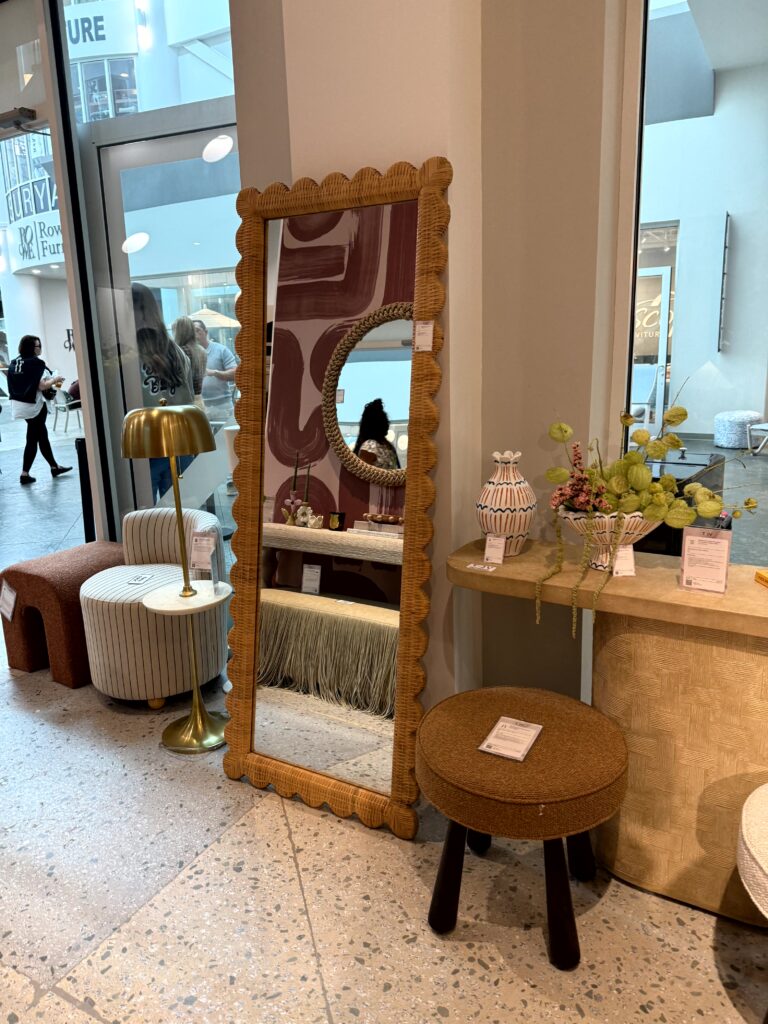 Mirror with scalloped edges. High Point Market Lindsey Putzier interior design, Hudson Ohio 