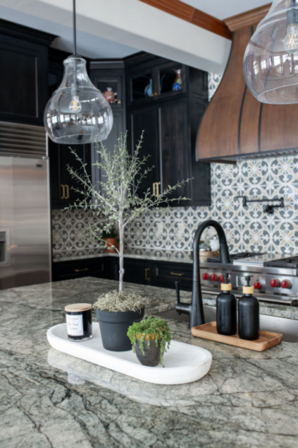 Kitchen with patterned backsplash. Lindsey Putzier interior design Hudson Ohio