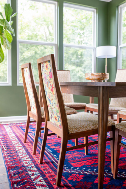 Dining room with colorful carpet ans reupholstered chairs. Lindsey Putzier interior design Hudson Ohio