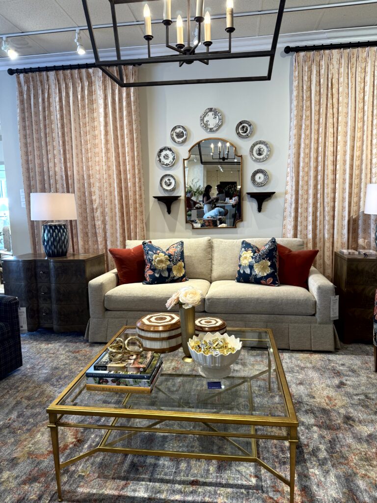 Couch with floral accent pillows - High Point Market, interior design trends, Lindsey Putzier Hudson Ohio