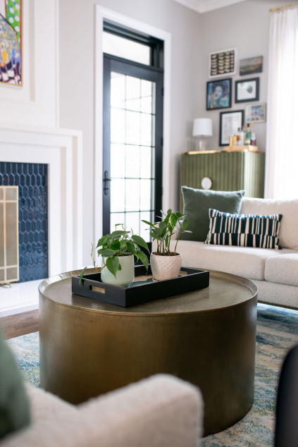 Modern living room with accents of blue. Lindsey Putzier interior design Hudson Ohio