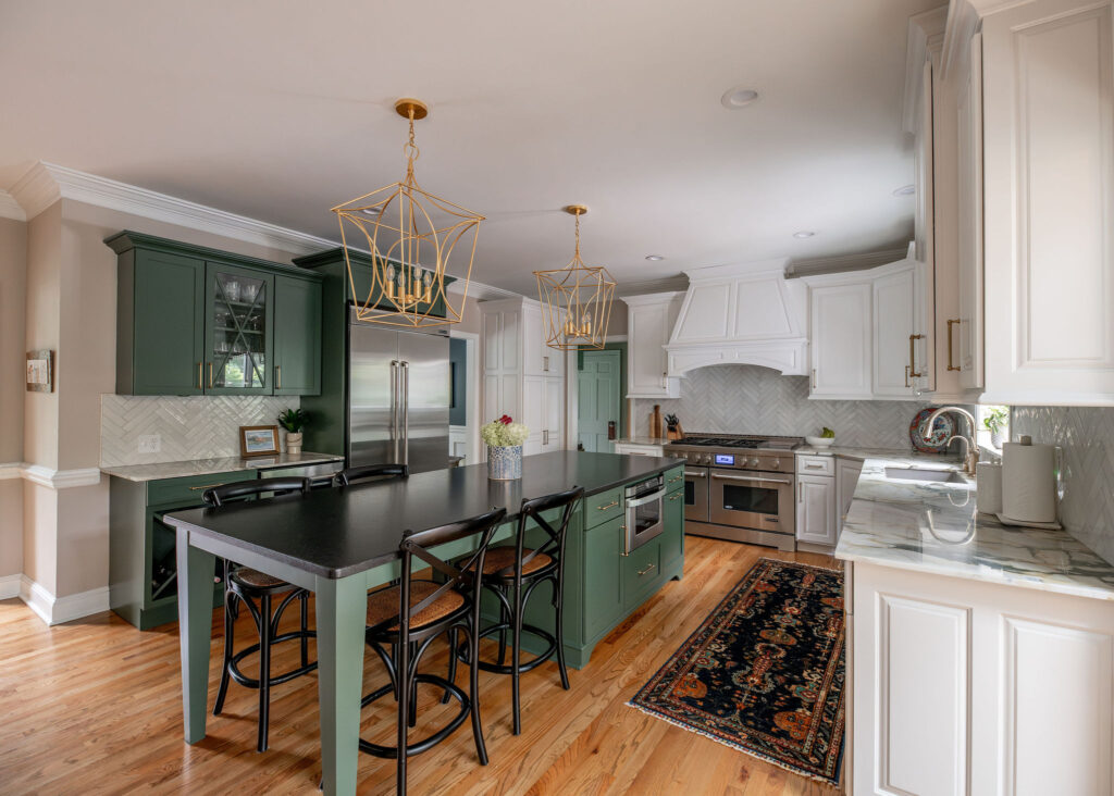 After of the kitchen island in a green sage color. Lindsey Putzier interior design Hudson Ohio  